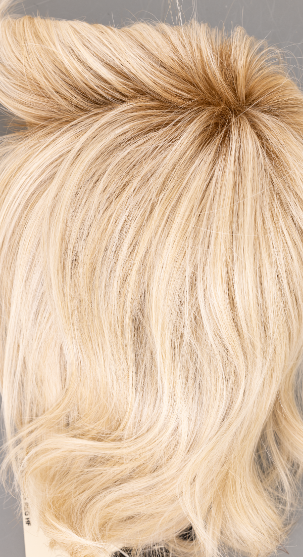 Platinum Blonde with a Light Brown Root